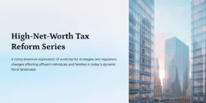 “Modern glass skyscrapers with sunrise light reflecting on the buildings, used as a cover image for the High-Net-Worth Tax Reform Series.”