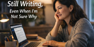 A Korean Enrolled Agent in her 40s working on a laptop by the window, symbolizing a 600-post WordPress blogging journey despite uncertainty