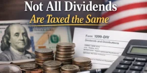 Not all dividends are taxed the same under U.S. tax law, showing Form 1099-DIV, U.S. dollar bills, and a calculator